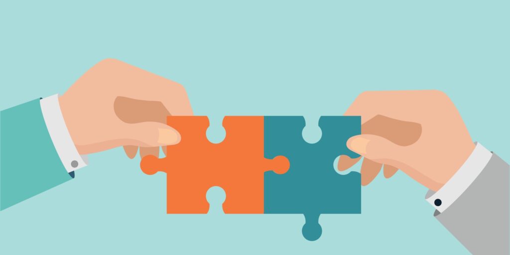 Hands,Combine,Jigsaw,Puzzle,,Combined,Two,Pieces,Symbol,Of,Collaboration