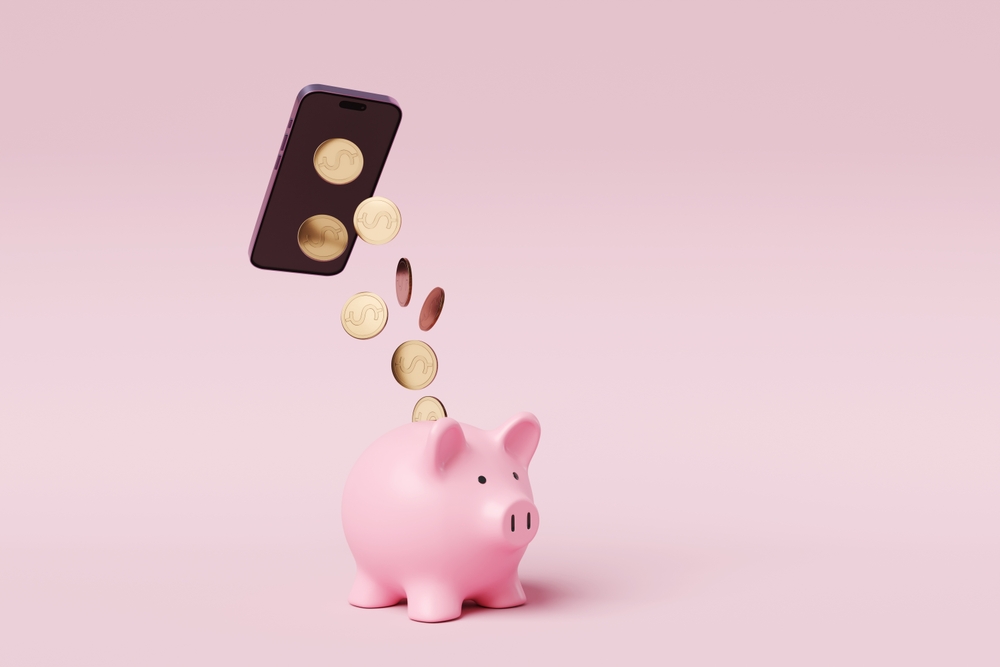 10 Apps en tools om je financiën slim te beheren in 2025 Golden,Coins,Falling,From,The,Screen,Of,A,Mobile,Phone